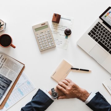 office laptop man suit watch newspaper phone calculator voip